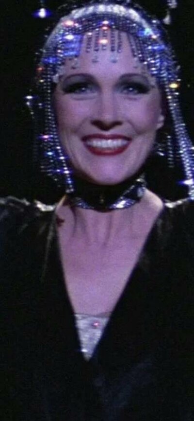 A Day at the Movies: Victor/Victoria (Dementia-Friendly) 31 October, 2026 Woman performing with two men on either side wearing white hats
