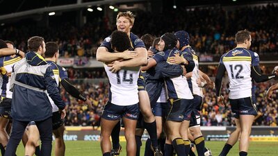 Brumbies celebrate win over Lions in 2013.