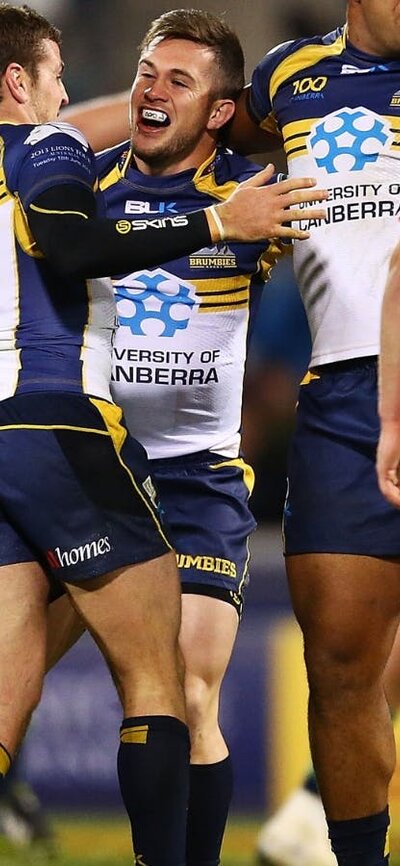 Brumbies celebrate win over Lions in 2013.