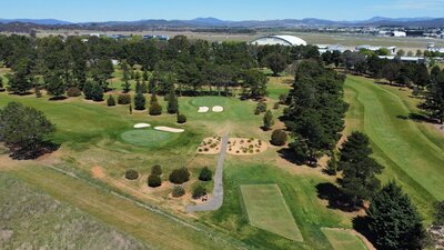 11th green and 12th hole showing proxikmity to the airport and views to the Brindabellas