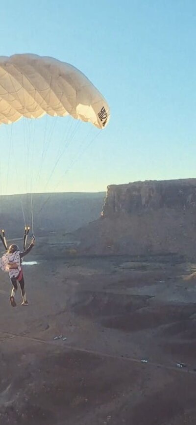 Paraglider over a canyon