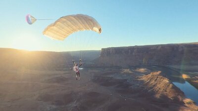 Paraglider over a canyon