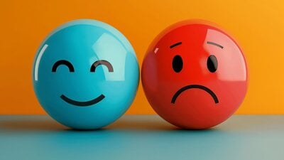 Two balls with Happy and Sad faces