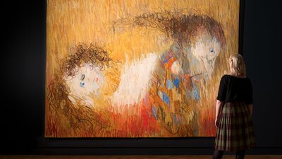 Arthur Boyd, Manufactura de Tapeçarias de Portalegre, St Francis when young turning aside, 1972 View of inside art exhibition with large tapestry and a visitor