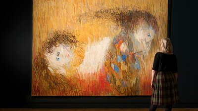 Arthur Boyd, Manufactura de Tapeçarias de Portalegre, St Francis when young turning aside, 1972 View of inside art exhibition with large tapestry and a visitor