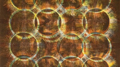 An abstract print of a grid of 4x4 glowing circles.