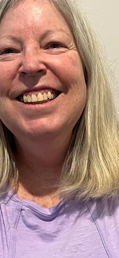 Jennifer Adams, smiling broadly.