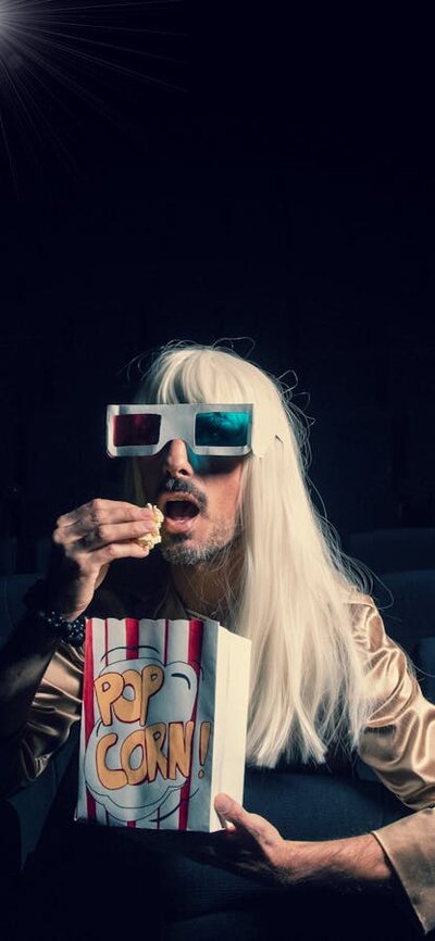 Pre-screening introduction and live performance by Venus Mantrap Venus Mantrap pictured in a cinema eating popcorn