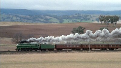 a steam train zooming through the screen