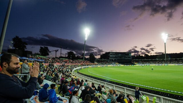 Wide shot view of Manuka Oval filled with fans