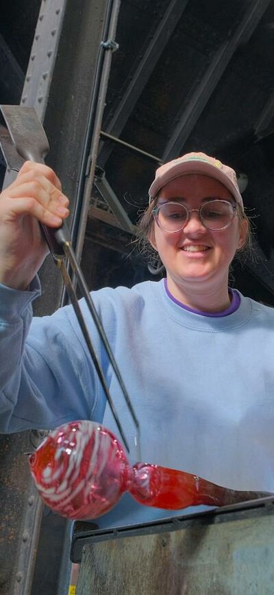 Make Your Own glassblowing class at Canberra Glassworks Participant glass blowing in MYO class