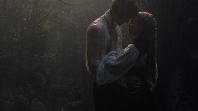 Wuthering Heights, Sun 15 Mar 2:00 PM A woman and man embrace in the rain