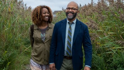 American Fiction, Sun 12 Apr 2:00 PM A woman and man walking through grassy fields laughing