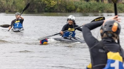 A paddler plays for the ball with their paddle