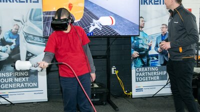 Student using a virtual welder supplied by Sikkens at the Canberra CareersXpo