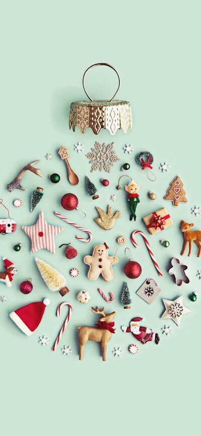 An artwork of Christmas ornaments arranged in the shape of a Christmas bauble