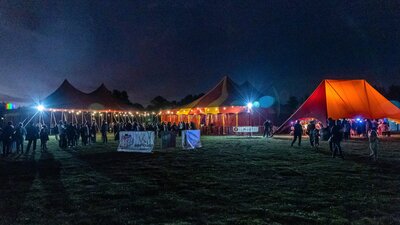 A queue of people outside a bigtop tent. Nimble by Rooke is great circus for the whole family