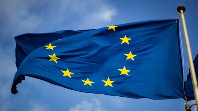 European flag on sky background