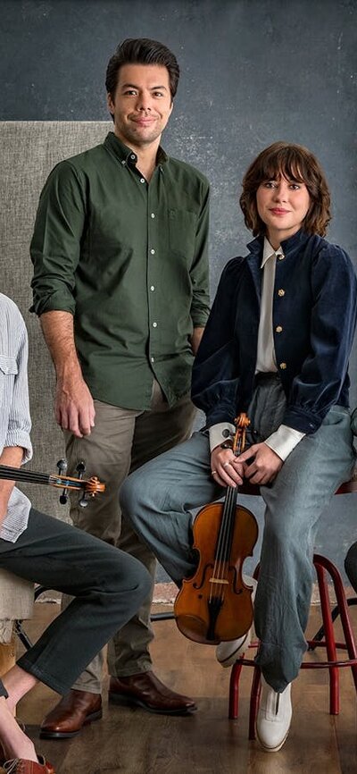 four musicians with their instruments