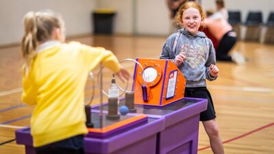 Children interacting with an exhibit at a Questacon Pop-up Science Centre