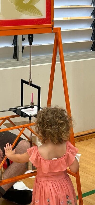 Children interacting with an exhibit at a Questacon Pop-up Science Centre