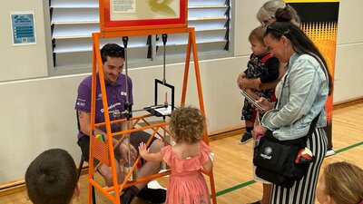 Children interacting with an exhibit at a Questacon Pop-up Science Centre