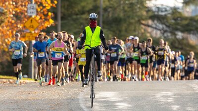 Lead bike ahead of the half marathon starting group