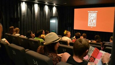 CSFF logo in cinema screen Cinema Screen showing CSFF logo with audience watching from right side