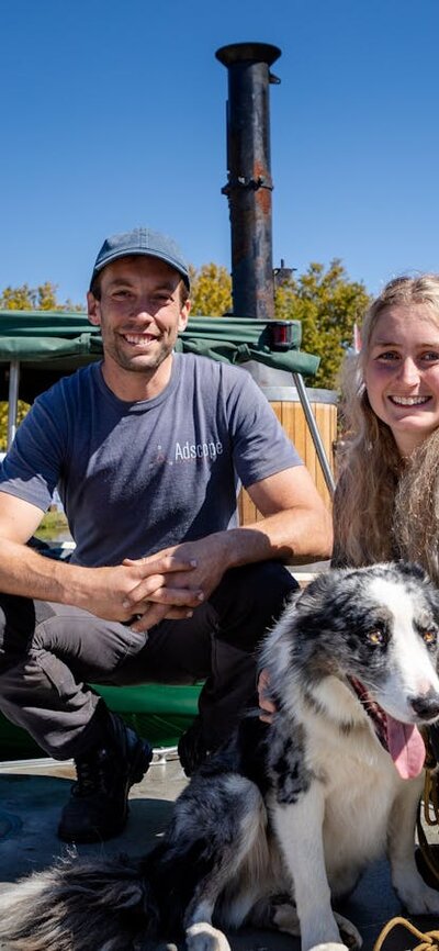 The owners of traditional boats can be as fascinating as the boats themselves Steam Launch Belle with owners Adam, Antonia and the ship's dog