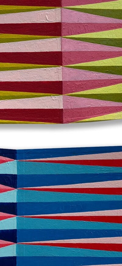 Rectangles of card, with undulating folds, and painted patterns of elongated lozenges, from above.