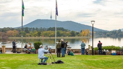 Artists painting on the lawn of Government House overlooking Lake Burley Griffin Artists painting on the lawn of Government House overlooking Lake Burley Griffin