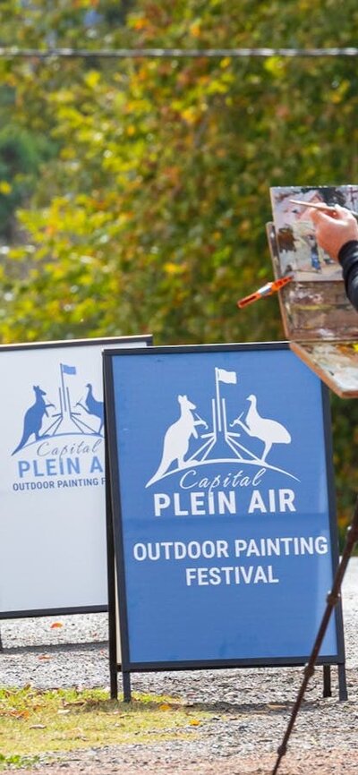 An artist painting on Cork St Gundaroo An artist painting on Cork St Gundaroo