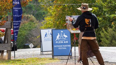 An artist painting on Cork St Gundaroo An artist painting on Cork St Gundaroo