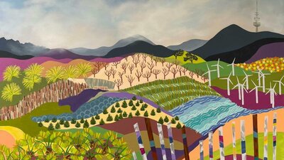 Brightly coloured landscape with geometrically patterned mountains and telstra tower in the backgrou