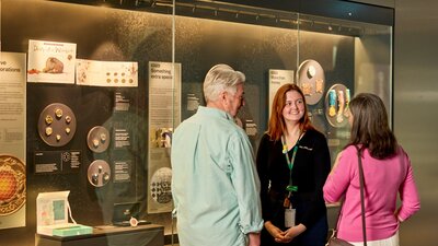 Couple on a free guided tour at the Mint
