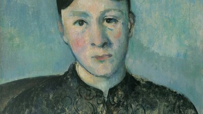 Paul Cézanne, Portrait of Madame Cézanne, c 1885, Museum Berggruen, Neue Nationalgalerie – Staatlich A front on portrait painting of Madame Cézanne with a blue background