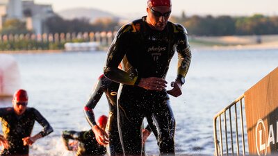 Swimmers exiting the water