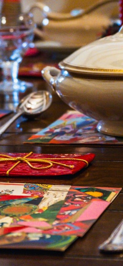 Historical Christmas objects laid out on dining table at Calthorpes House
