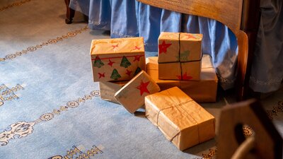 Christmas presents on display in bedroom at Calthorpes House