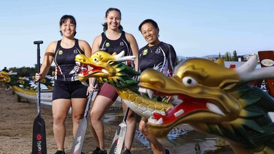 3 Dragon Boat paddlers