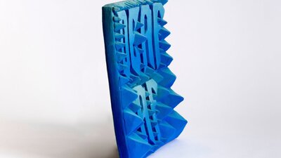 Side view of textured ceramic artwork by Kirsty Collins.