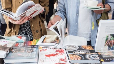 People browsing cookbooks