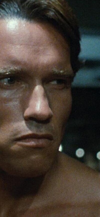 Still from The Terminator showing a portrait of a man