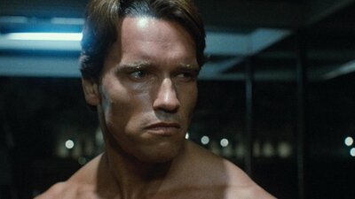 Still from The Terminator showing a portrait of a man