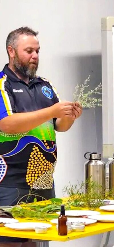 Wiradjuri man Adam Shipp presents to a classroom style audience