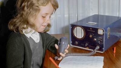 A School of the Air student participating in a lesson via two-way radio