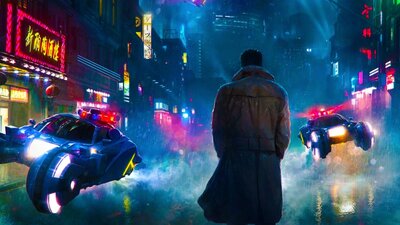Blade Runner: The Final Cut (1982) Man in coat standing with his back to us in a cyberpunk scene