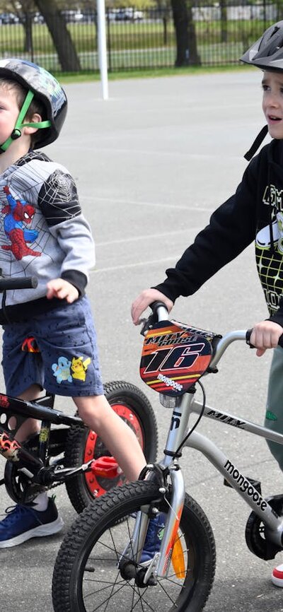Four young boys with their bikes