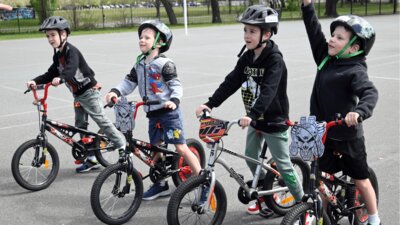 Four young boys with their bikes