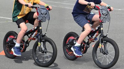 Twins on bikes